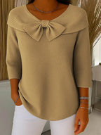 Back view of burgundy top showing 3/4 sleeve length