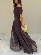 Close-up of off-shoulder neckline and delicate chiffon sleeves