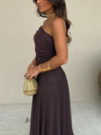 Detail shot of fitted bodice and sheer chiffon layering