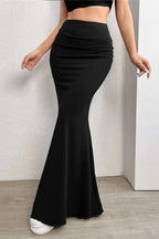 Detail shot of fitted hip and flared mermaid hem