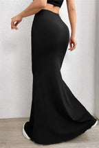 Mermaid skirt worn with styled top, full-body pose
