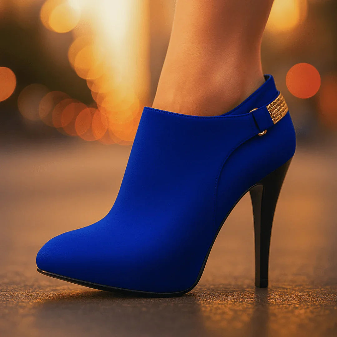 Back view of velvet ankle boot showing side zip fastening