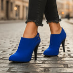 Detail of plush velvet texture and pointed toe cap