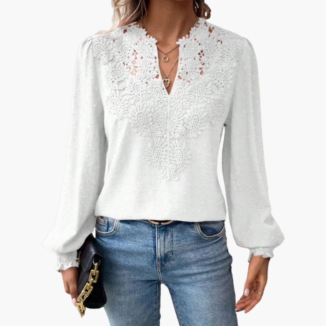 Full-length view of model wearing lace trim V-neck blouse