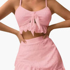 Detail shot of scoop neck ruffle neckline on bikini top