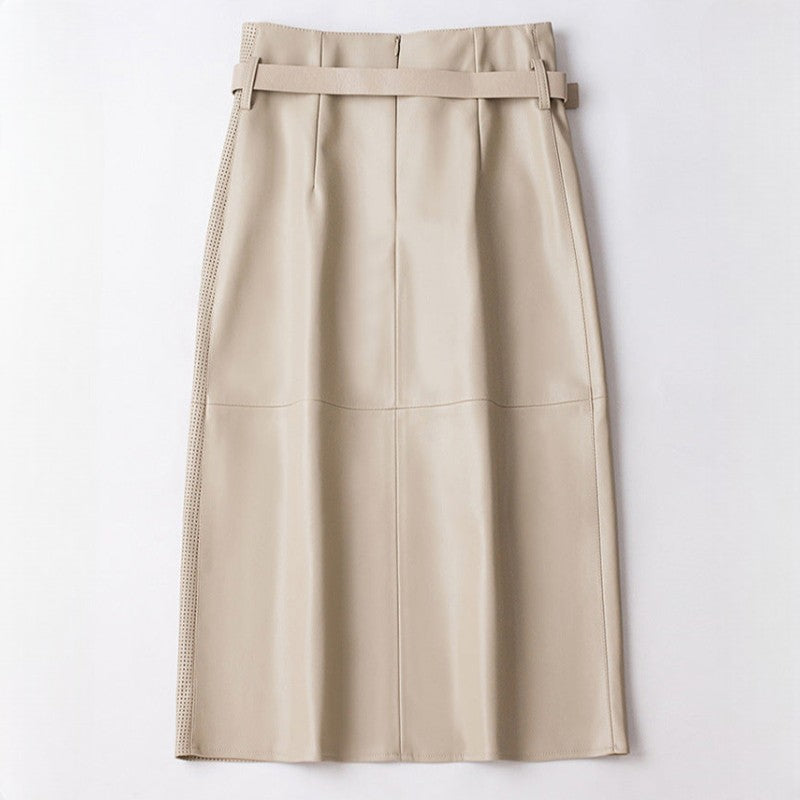 Model wearing leather midi skirt, full-length pose