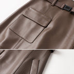 Functional pocket detail on leather skirt