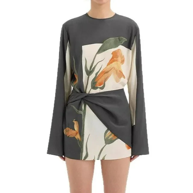 Full-length view of mini dress showing flowing silhouette and charcoal panel details