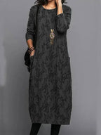 Back view of long sleeve maxi dress in forest green