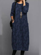 Side view of maxi dress showing relaxed silhouette and drape