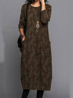 Detail of functional side pocket on floral maxi dress