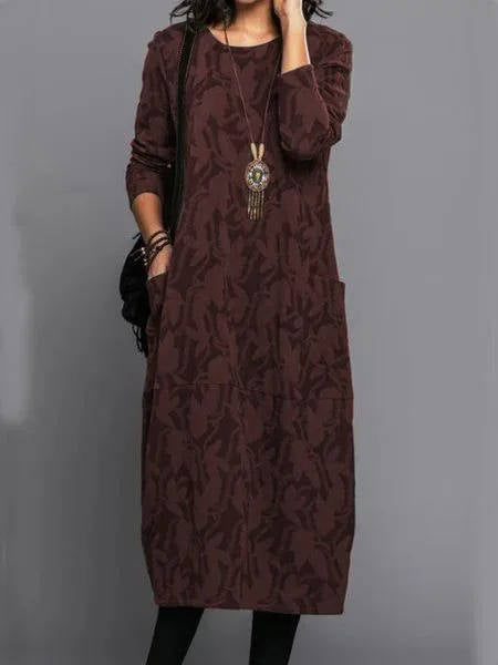 Long sleeve detail and neckline of floral jacquard dress