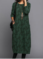 Model wearing floral maxi dress, full-length standing pose