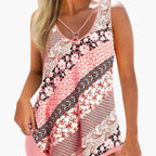 Close-up of floral print and contrasting black piping on tankini top