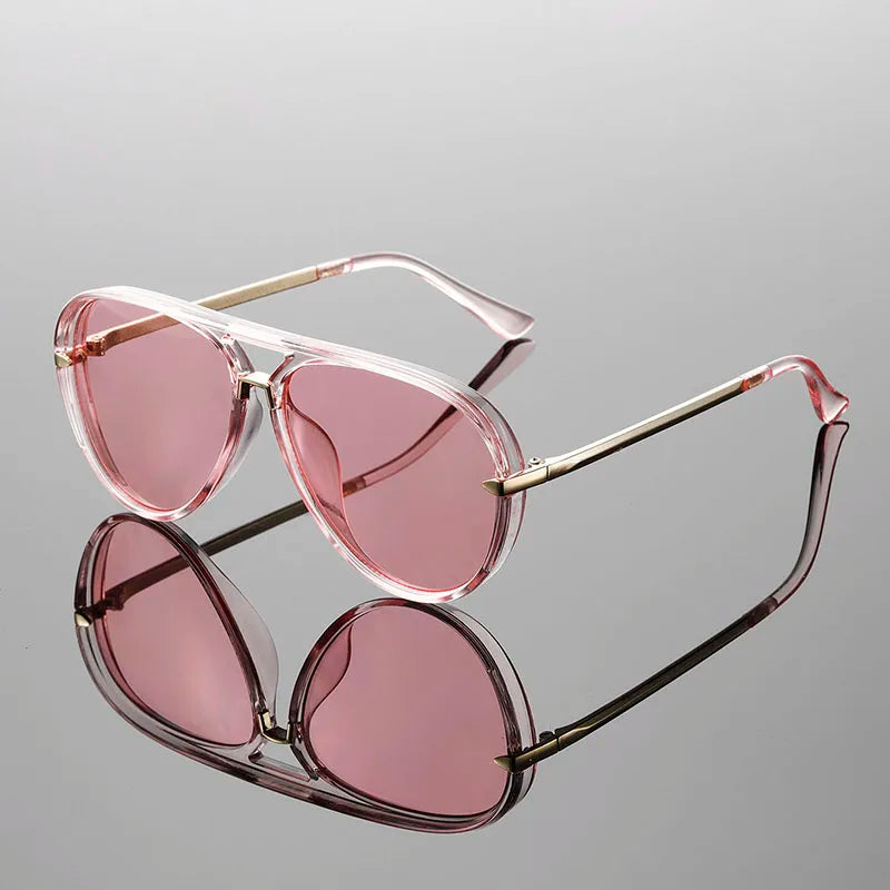 Model wearing gradient aviator sunglasses, front-facing pose