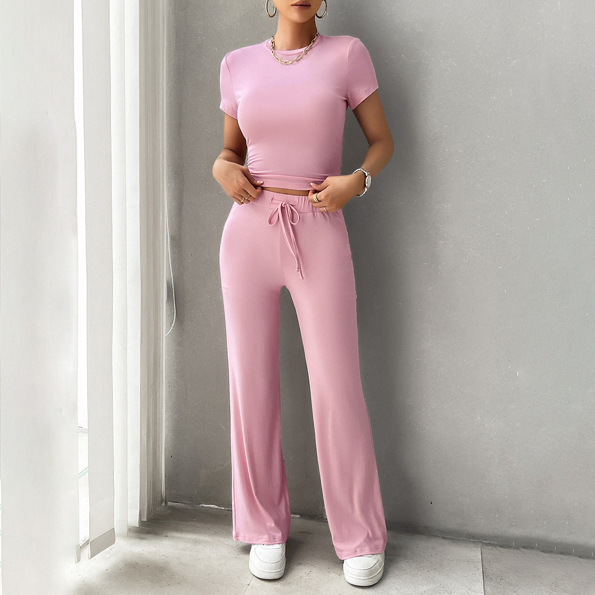 Detail shot of wide leg trouser hem and drape