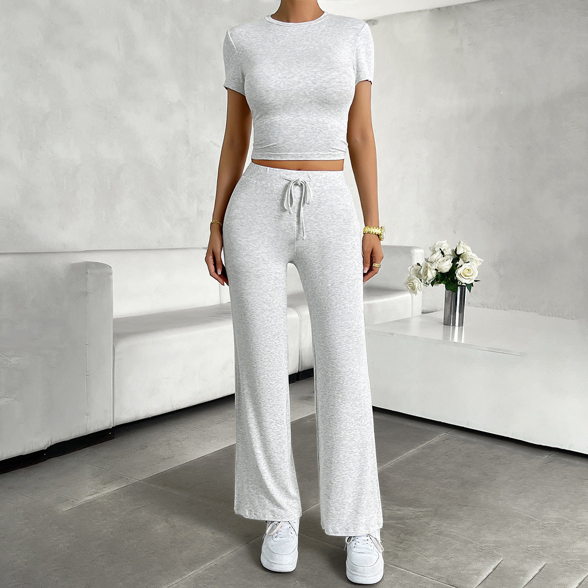 Close-up of crew neckline on cropped short sleeve top