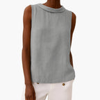 Women's sleeveless collared top with button back detail, front view