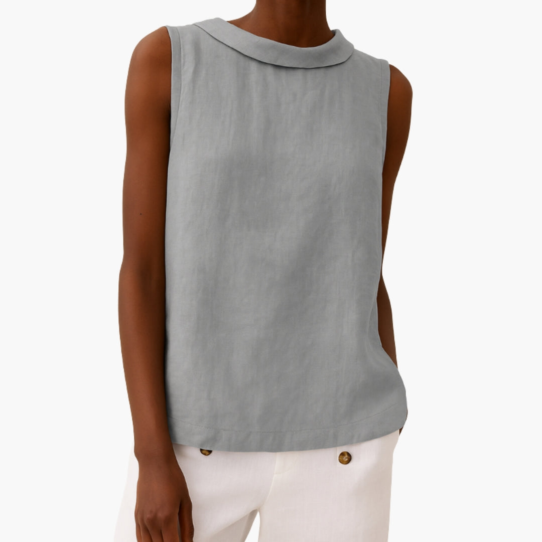 Women's sleeveless collared top with button back detail, front view