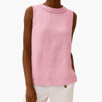Full-length back view of sleeveless collared top