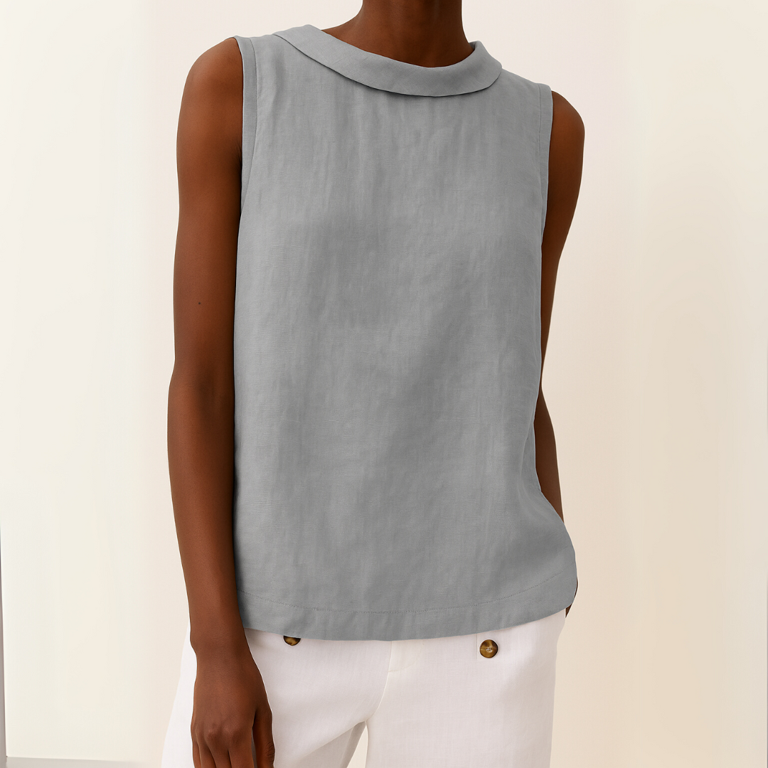 Women's sleeveless roll collar top in neutral tone, front view
