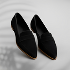 Grey suede loafer worn with casual dress, overhead angle