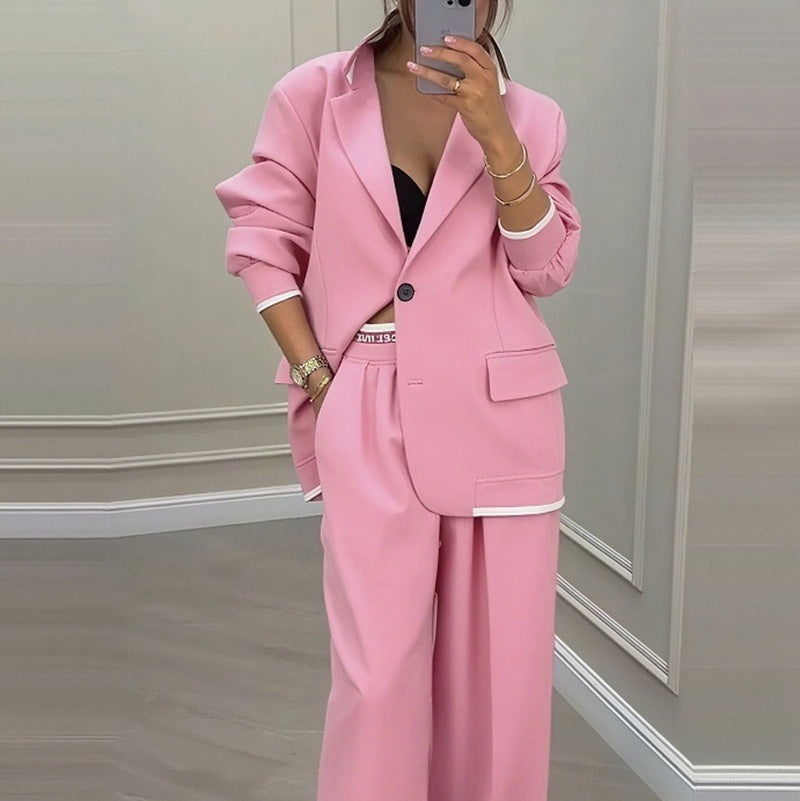 Full-length view of set styled for office wear
