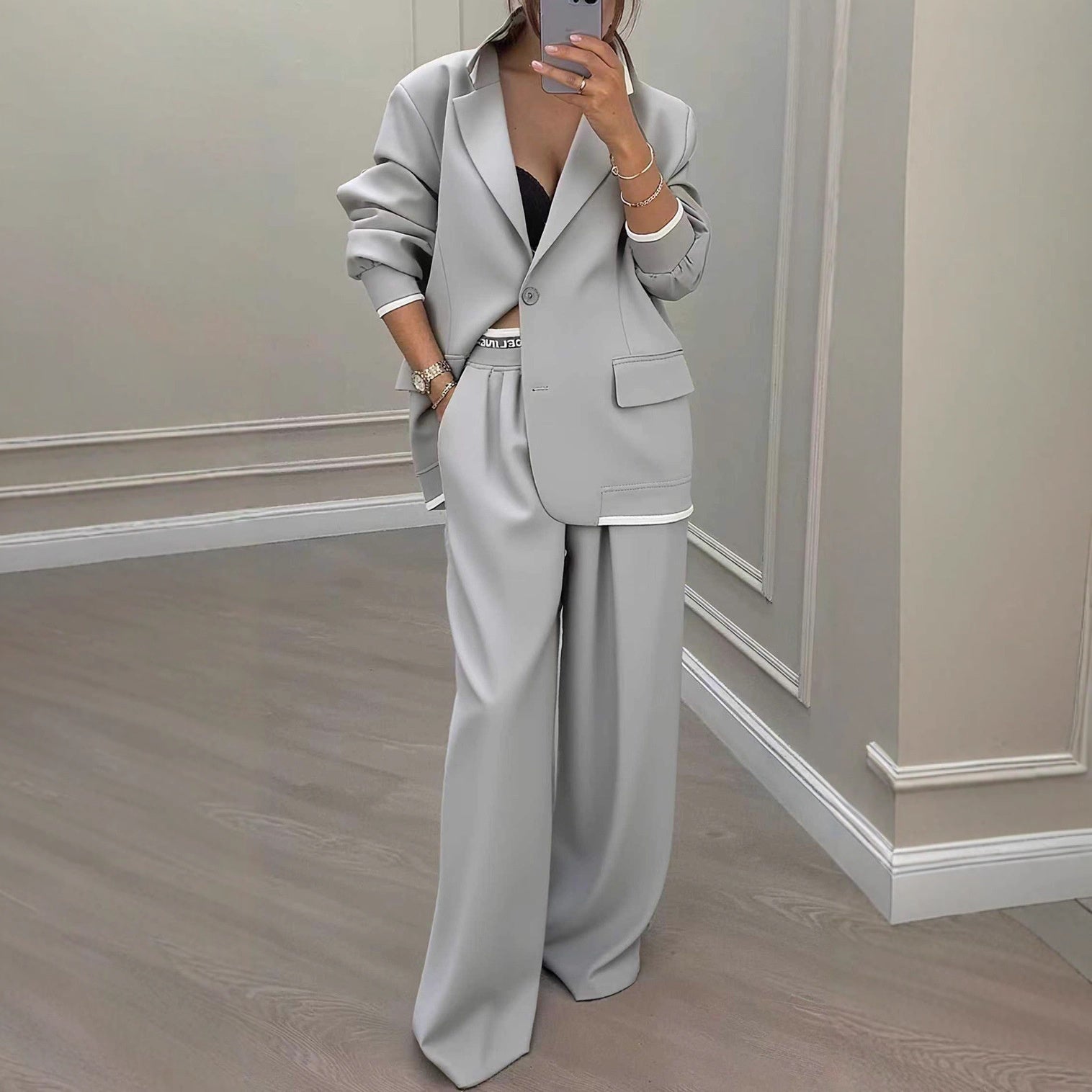 Women's grey wide leg blazer trousers set displayed flat