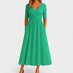 Woman walking in maxi dress demonstrating gathered skirt movement