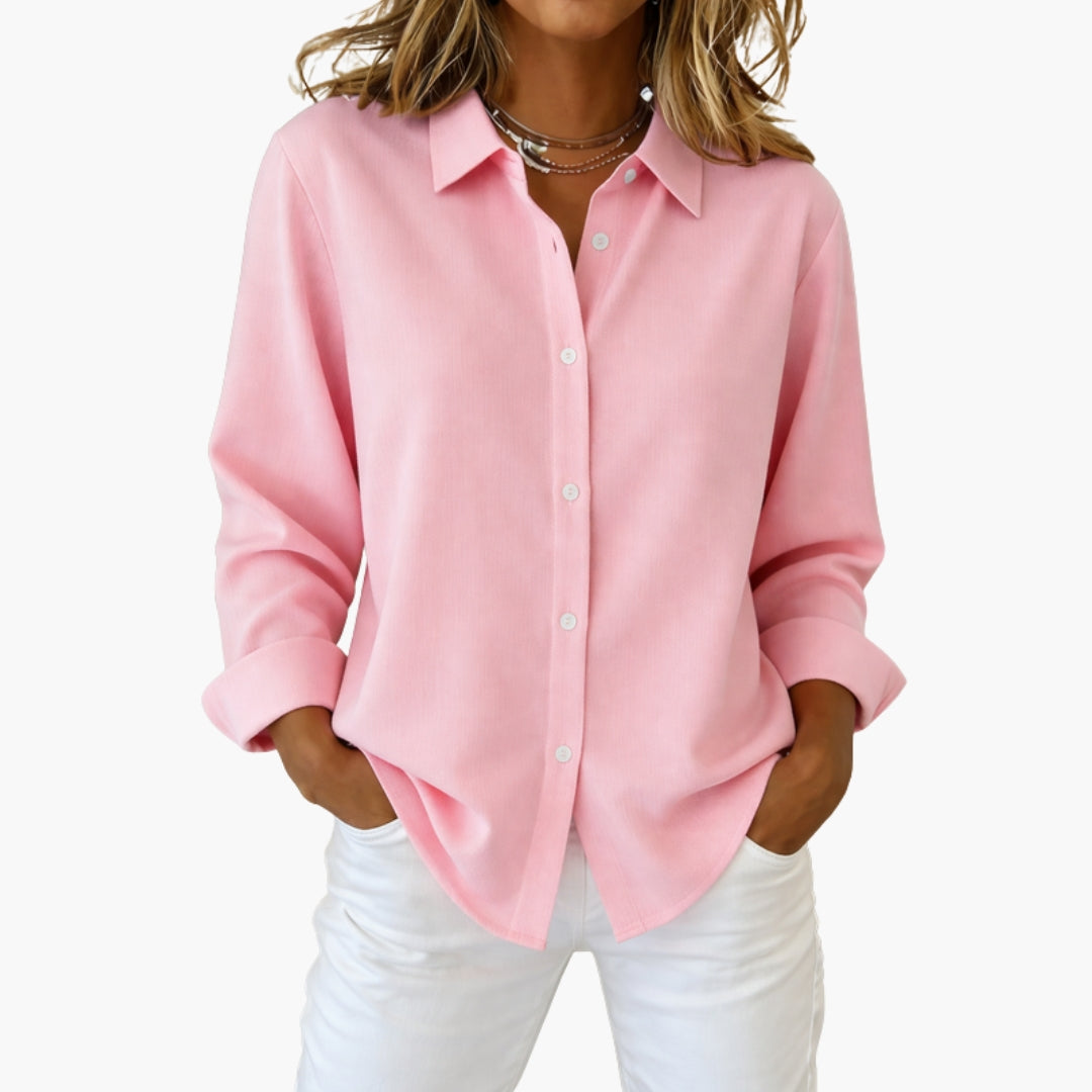 Model wearing hot pink collared shirt, front-facing pose