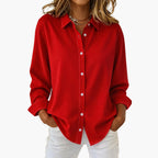 Side view of hot pink shirt showing relaxed fit and sleeve detail