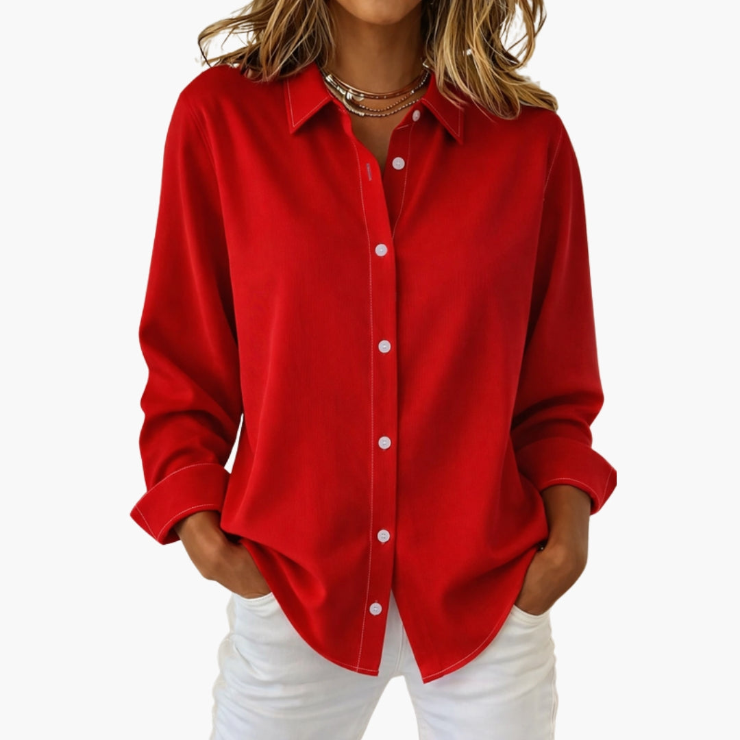 Side view of hot pink shirt showing relaxed fit and sleeve detail