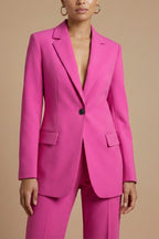 Model wearing blazer set, standing pose with hands relaxed
