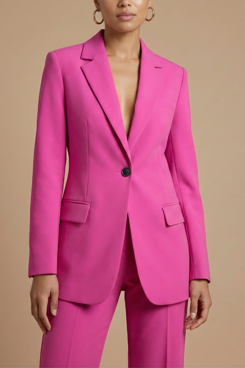 Model wearing blazer set, standing pose with hands relaxed