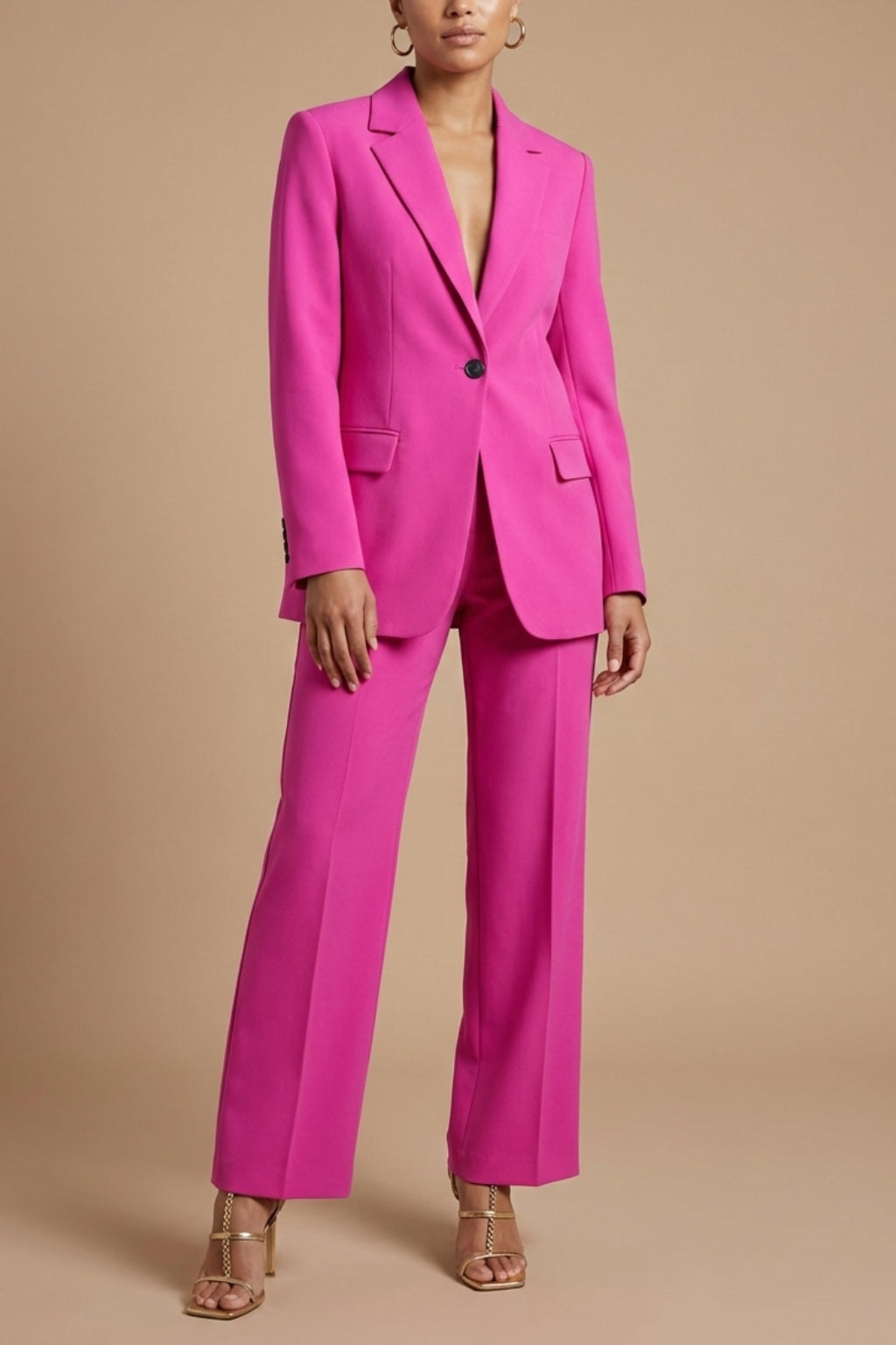 Women's hot pink blazer set with wide leg trousers, front view
