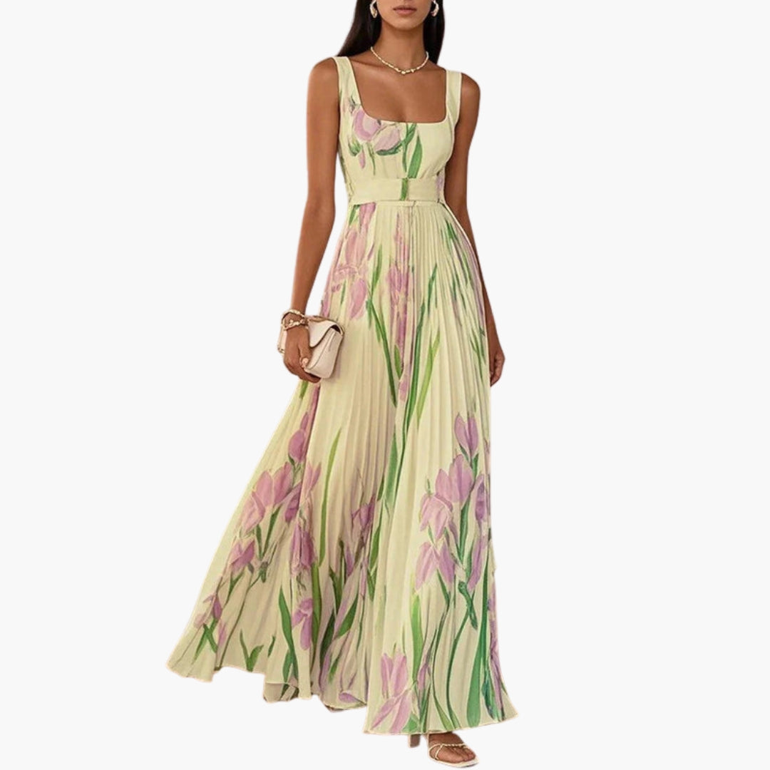 Woman posing in floral dress showing movement of fabric and dress length