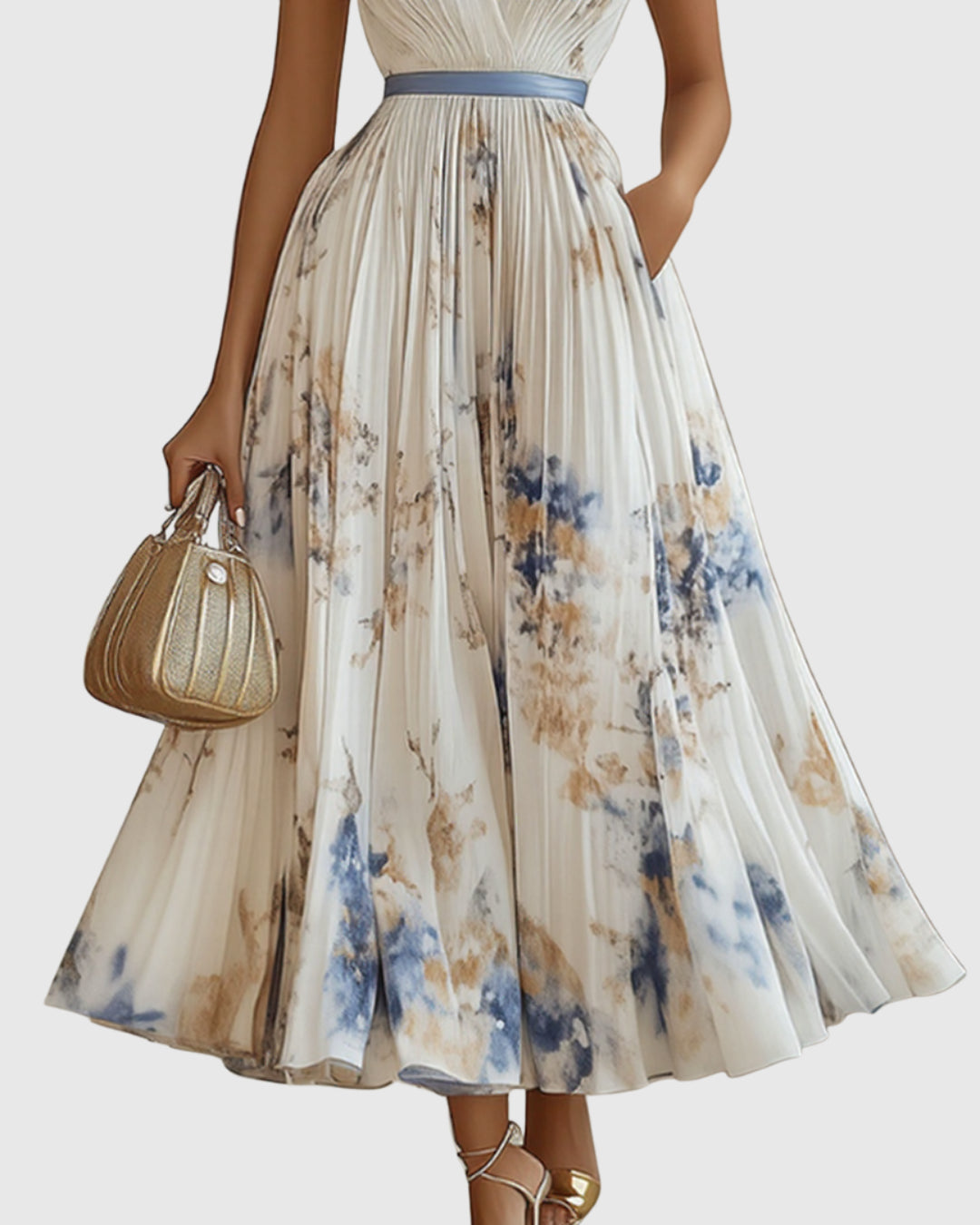 Side angle displaying flowing pleated fabric and dress length