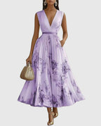 Full-length back view of dress and pleated design