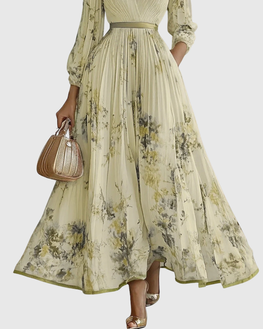 Model posing outdoors in garden setting wearing floral dress