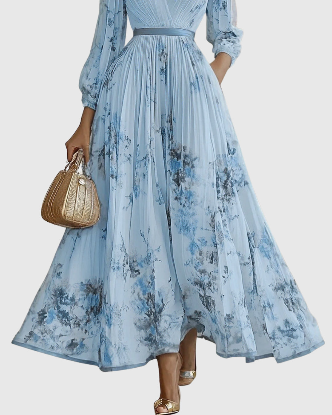 Floral print detail on muted-tone maxi dress fabric