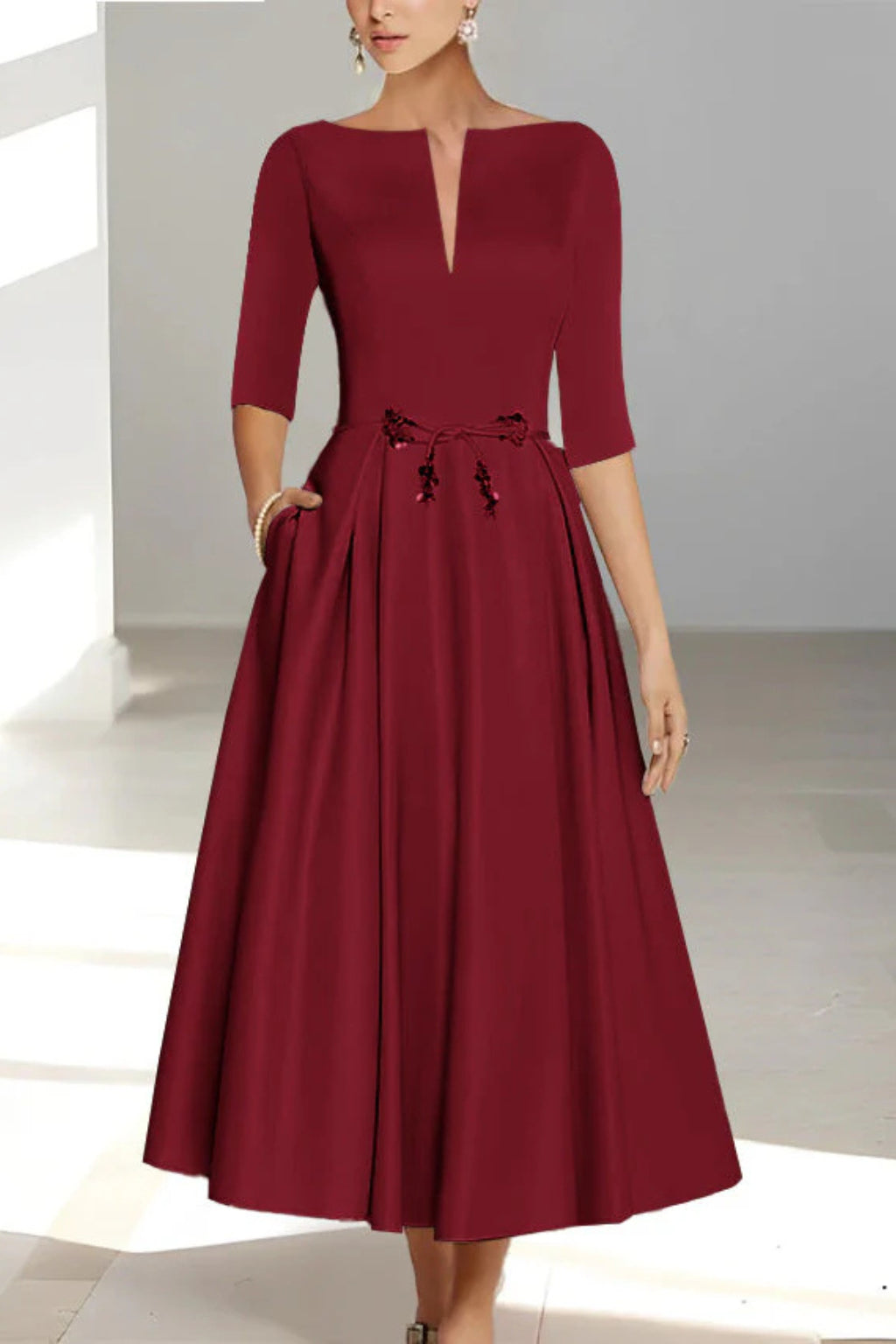 Side pocket detail on midi wedding dress
