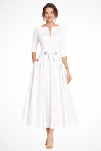 Full-length angle of dress from side, showing silhouette