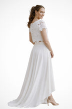 Full-length shot of two-piece wedding ensemble on model