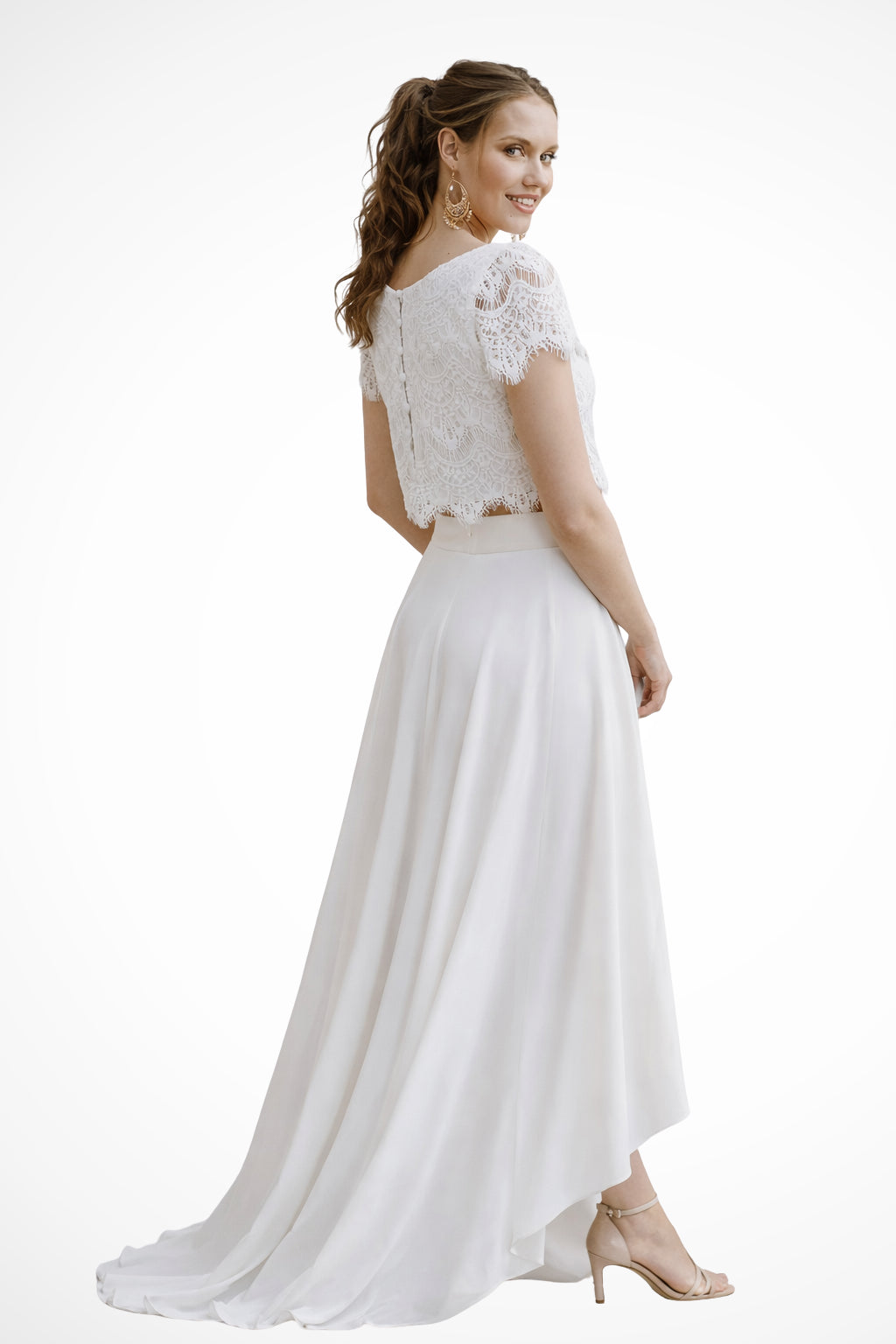 Full-length shot of two-piece wedding ensemble on model