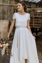 Model wearing set, walking pose showing maxi skirt movement