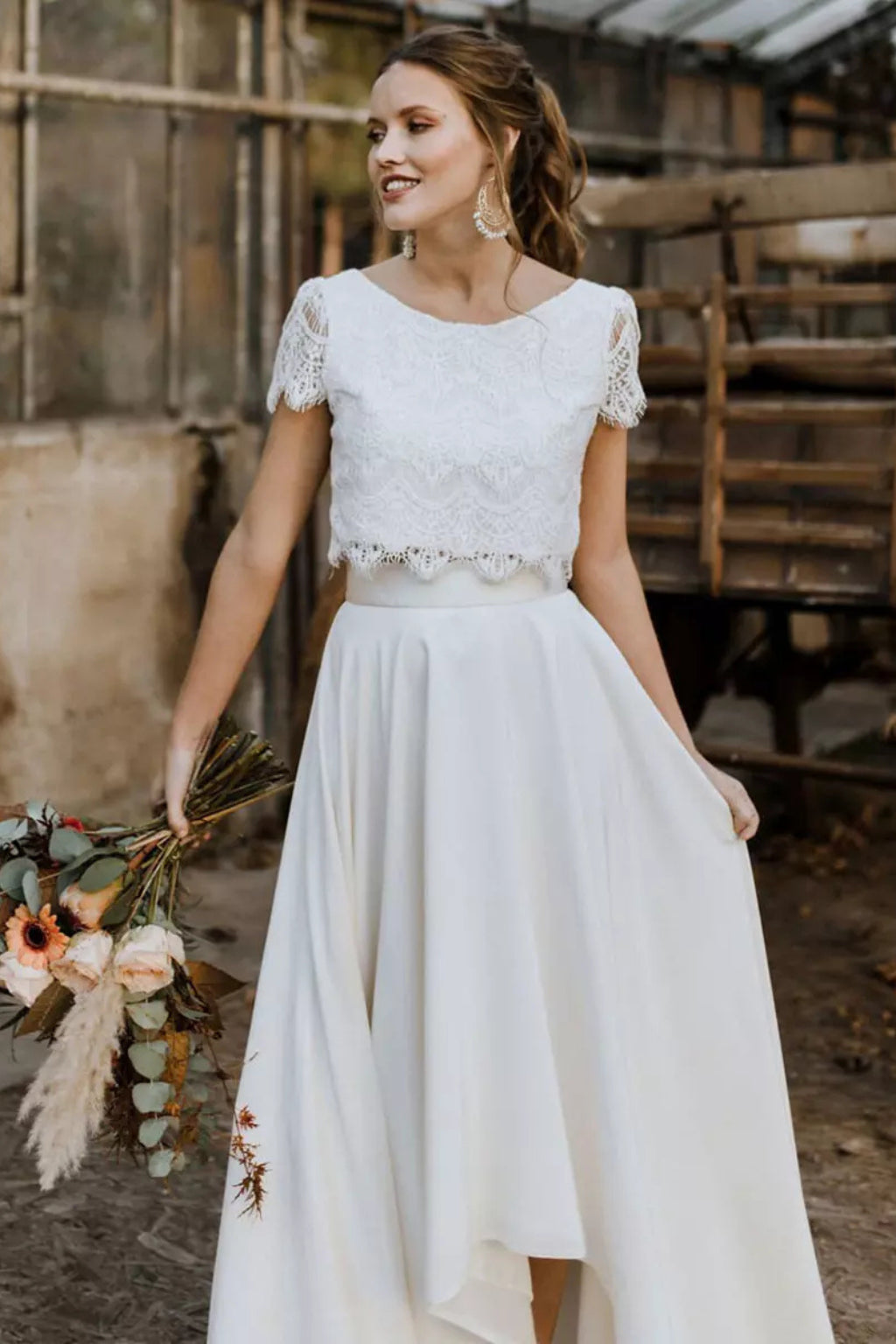 Model wearing set, walking pose showing maxi skirt movement