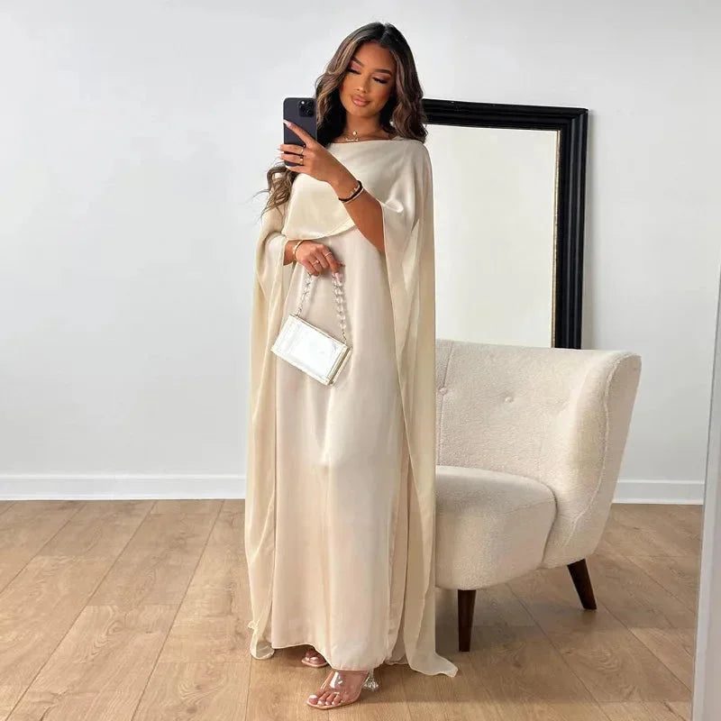 Women's cape overlay maxi dress with round neckline, full length view
