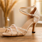 Close-up of pearl and crystal detailing on satin heel upper