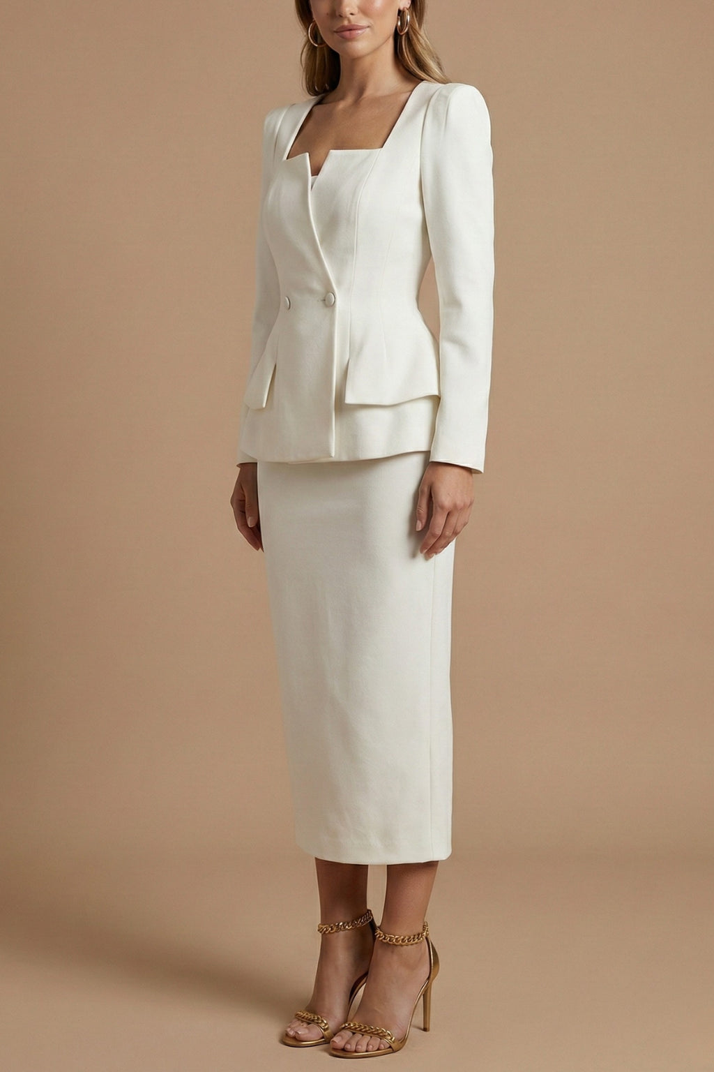Close-up detail of double-breasted buttons and peplum hem