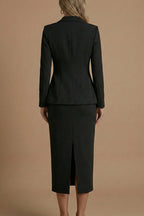 Detail shot of midi skirt waistband and tailoring